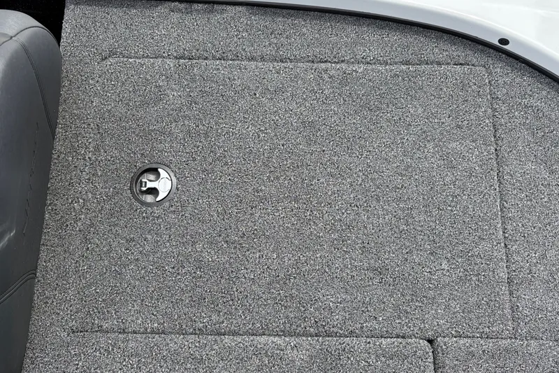 Slide: The Image of Carpeted deck of 2027 Nitro Z17 boat with storage compartment. - 24