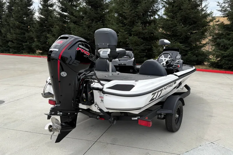 Slide: The Image of 2027 Nitro Z17 boat with Mercury Pro XS engine, parked outdoors. - 8