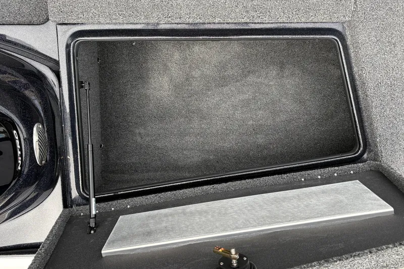 Slide: The Image of Open storage compartment in a 2027 Nitro Z17 boat, featuring a sleek interior design. - 34