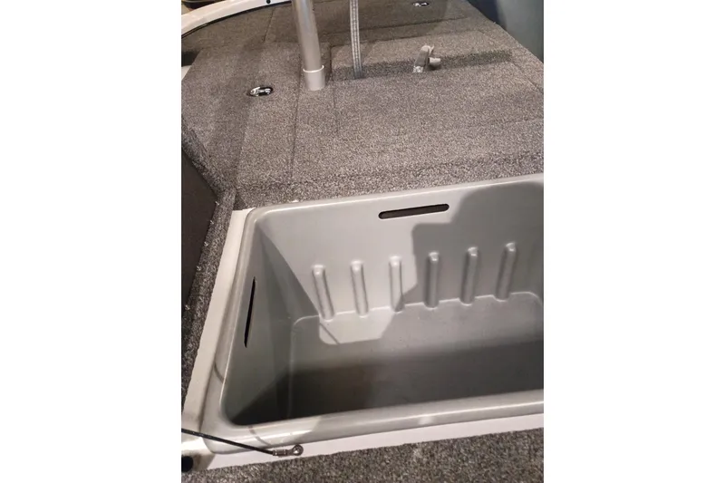 Slide: The Image of Interior view of a 2027 Nitro Z17 boat, featuring a storage compartment. - 4