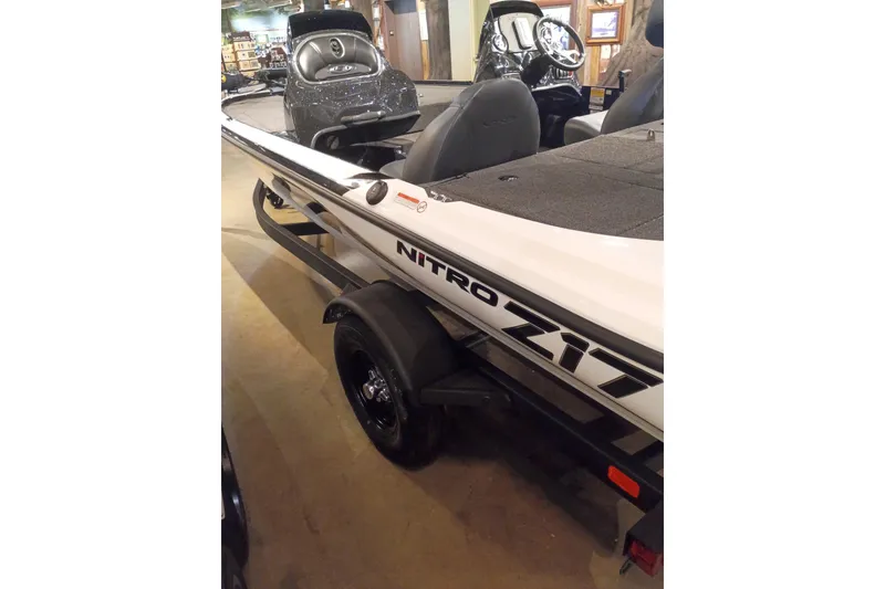 The Image of 2027 Nitro Z17 boat on display, featuring sleek design and modern seating. - 0
