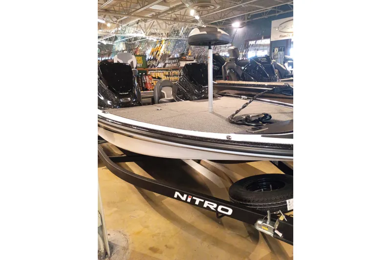Slide: The Image of 2027 Nitro Z17 boat displayed indoors on a trailer. - 1