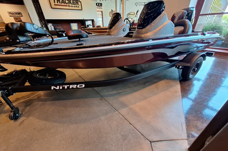 The Image of 2027 Nitro Z17 boat on display in showroom, featuring sleek design and modern features. - 0