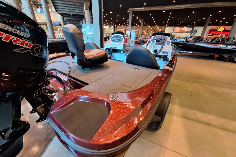 Slide: The Image of 2027 Nitro Z17 boat with Mercury Pro XS engine displayed in a showroom. - 100