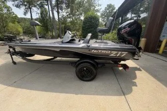 The Image of 2027 Nitro Z17 boat parked outdoors, showcasing sleek design and modern features. - 0