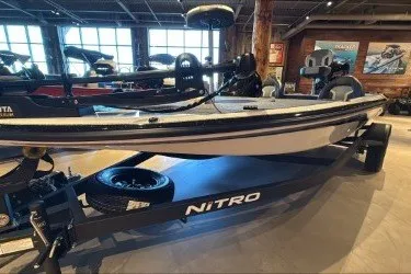 The Image of 2027 Nitro Z17 boat displayed in a showroom with trailer. - 0