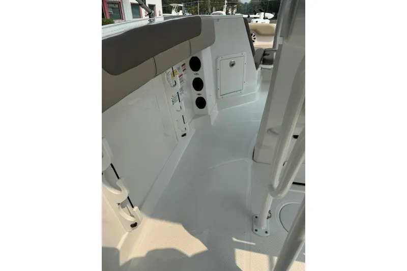 Slide: The Image of Interior view of 2026 Tahoe 2150 CC boat, showcasing seating and storage compartments. - 15