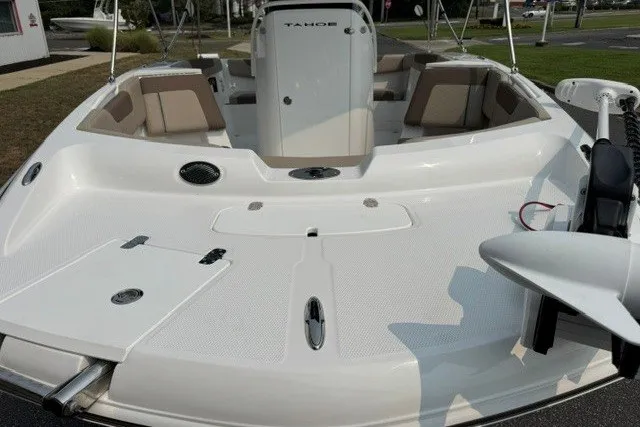 Slide: The Image of 2026 Tahoe 2150 CC boat with spacious seating and modern design. - 19