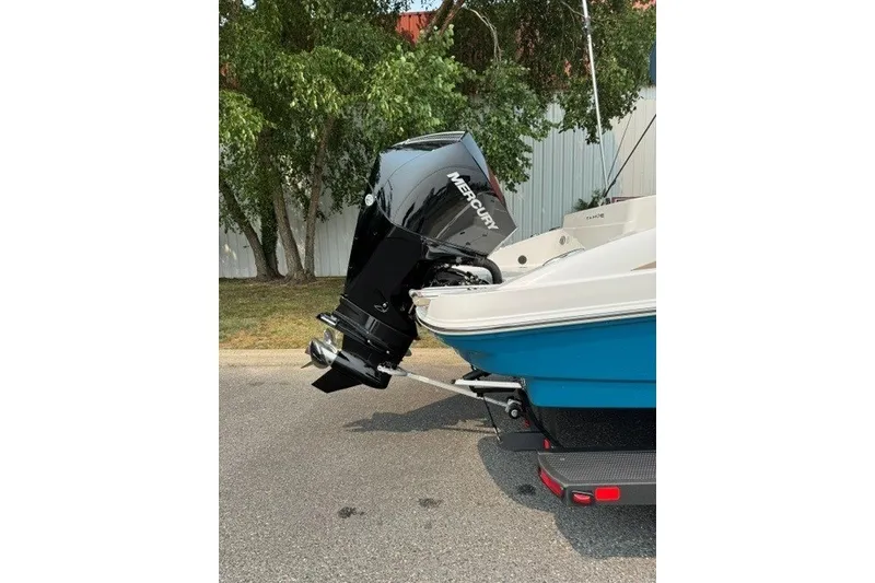 Slide: The Image of 2026 Tahoe 2150 CC boat with Mercury outboard motor on trailer. - 20