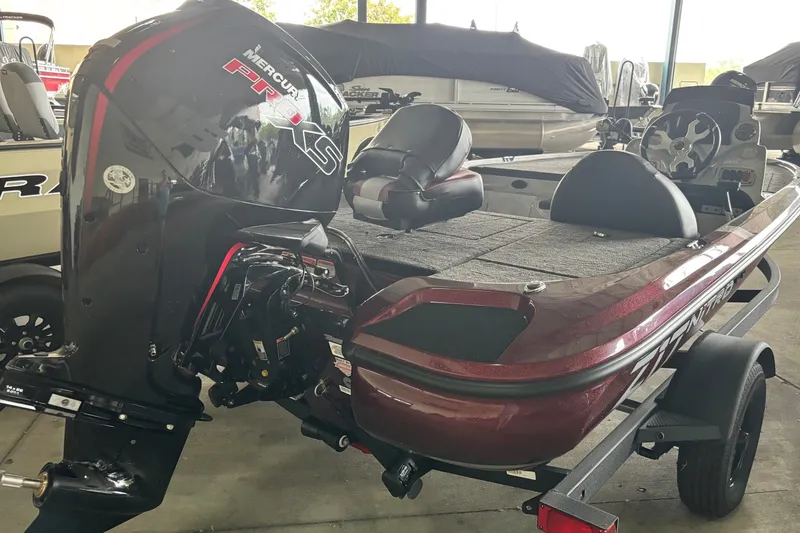 Slide: The Image of Nitro Z17 2027 boat with Mercury Pro XS engine, parked indoors. - 2