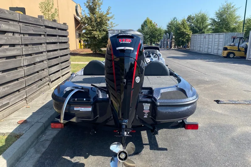 Slide: The Image of Nitro Z17 2027 boat with Mercury outboard motor in a parking area. - 6
