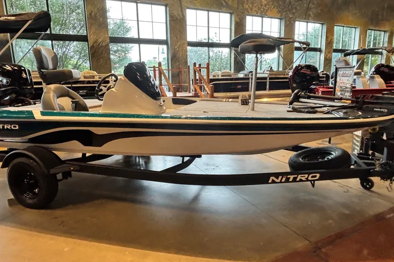 The Image of 2027 Nitro Z17 boat displayed indoors on a trailer, featuring sleek design and modern features. - 0