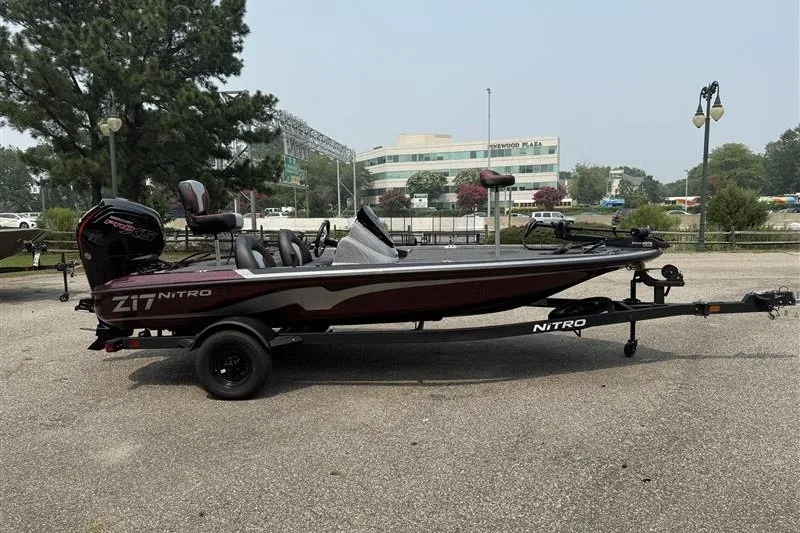 Slide: The Image of 2027 Nitro Z17 boat on trailer in parking lot, side view. - 7