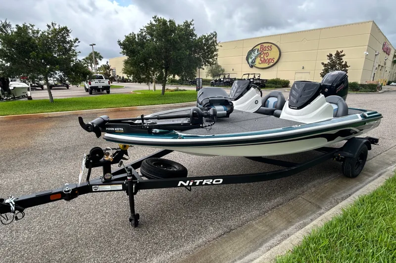Slide: The Image of 2027 Nitro Z17 fishing boat on trailer outside Bass Pro Shops. - 5