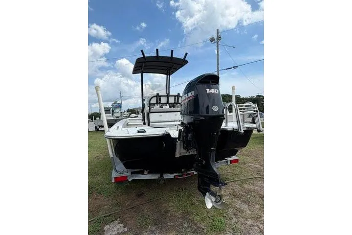 Slide: The Image of 2018 Key Largo 220 Bay boat with Suzuki 140 outboard motor on trailer. - 5