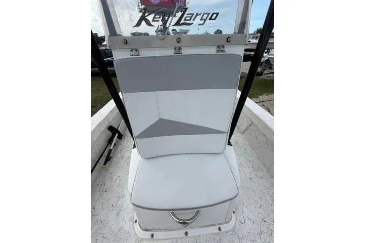 Slide: The Image of 2018 Key Largo 220 Bay boat seat with white and gray upholstery. - 12