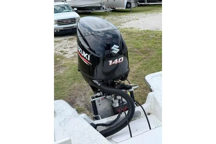 Slide: The Image of Outboard motor on 2018 Key Largo 220 Bay boat, Suzuki 140 horsepower engine. - 24