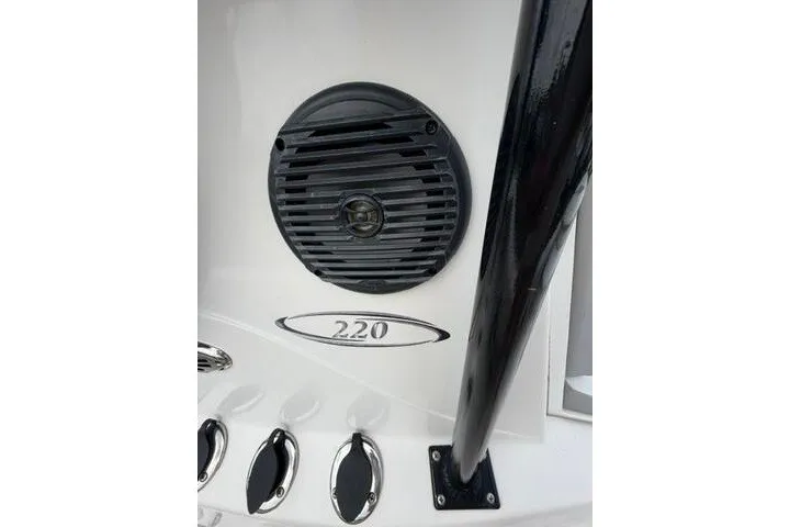 Slide: The Image of Speaker and controls on 2018 Key Largo 220 Bay boat dashboard. - 14
