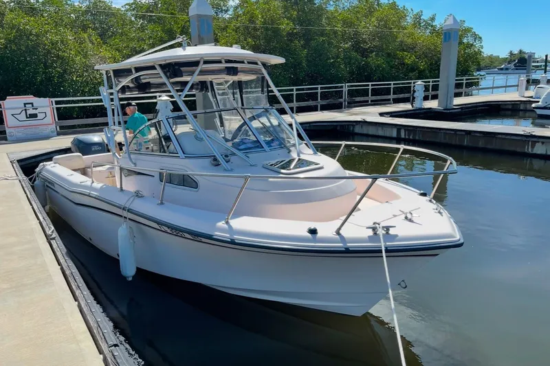 The Image of 2008 Grady-White Seafarer 226 boat docked in a marina. - 0