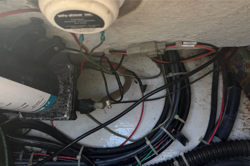 Slide: The Image of Electrical wiring and components inside a 2008 Grady-White Seafarer 226 boat. - 72