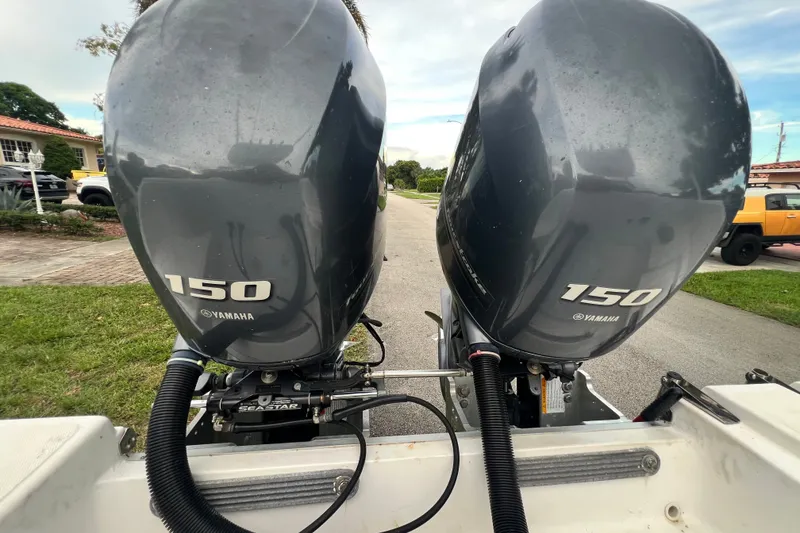 Slide: The Image of Twin Yamaha 150 engines on a 2015 Tidewater 250 CC Adventure boat. - 26