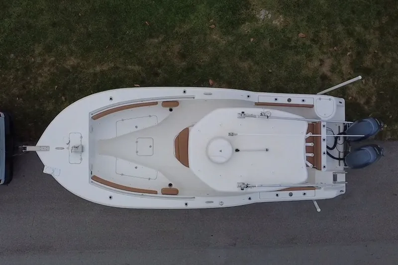 Slide: The Image of Overhead view of a 2015 Tidewater 250 CC Adventure boat on a trailer. - 70