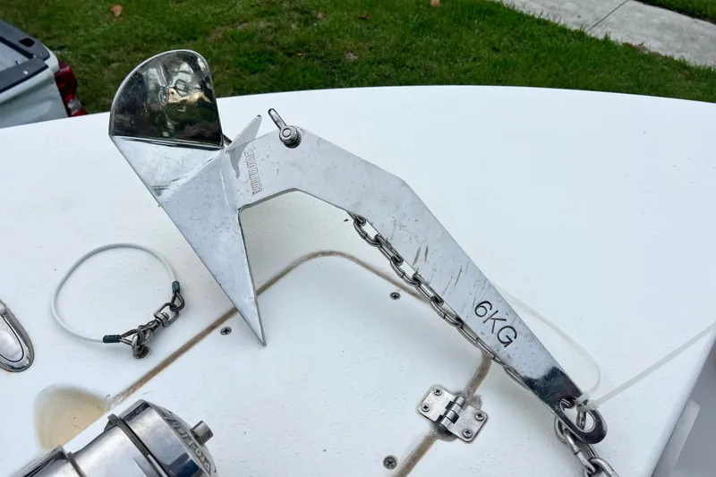 Slide: The Image of Anchor on 2015 Tidewater 250 CC Adventure boat deck, marked 6KG. - 57