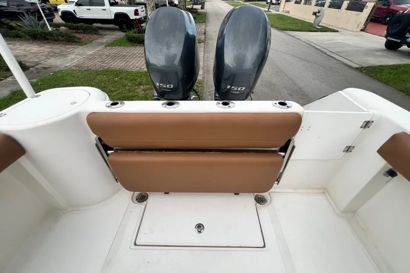 Slide: The Image of 2015 Tidewater 250 CC Adventure boat with dual 150 horsepower engines. - 29
