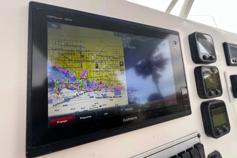 Slide: The Image of Garmin GPS display on 2015 Tidewater 250 CC Adventure boat dashboard. - 48