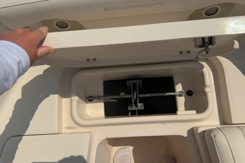 Slide: The Image of 2017 Grady-White Freedom 235 boat storage compartment with anchor inside. - 21