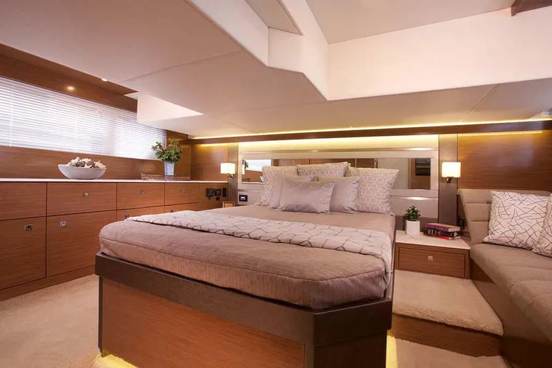 Slide: The Image of Manufacturer Provided Image: Luxurious bedroom interior of 2022 Cruisers Yachts 46 Cantius with modern decor and ambient lighting. - 11