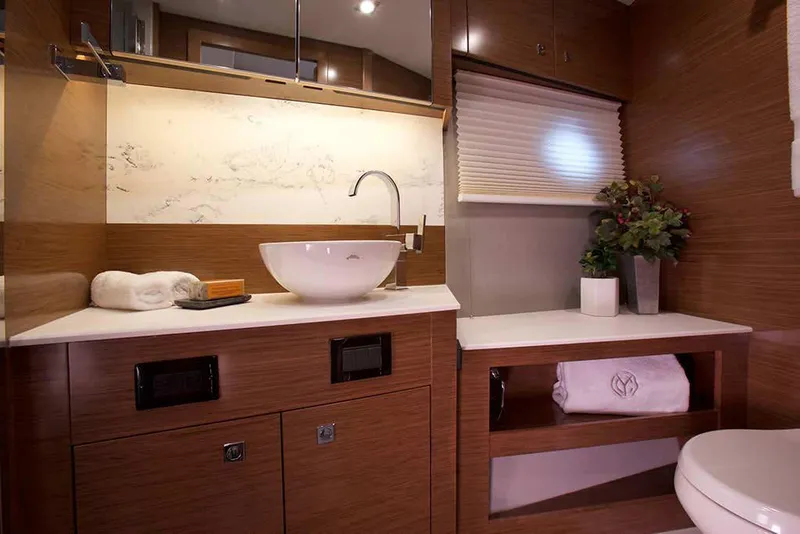 Slide: The Image of Manufacturer Provided Image: Luxurious bathroom in 2022 Cruisers Yachts 46 Cantius with modern fixtures and elegant design. - 14