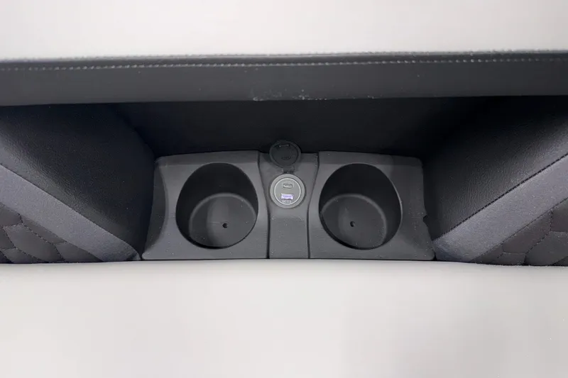 Slide: The Image of Cup holders and USB port in 2026 Sylvan L3 CLZ DH Tritoon boat interior. - 18