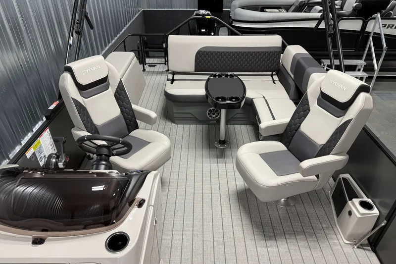Slide: The Image of 2026 Sylvan L3 CLZ DH Tritoon interior with luxurious seating and modern design. - 13