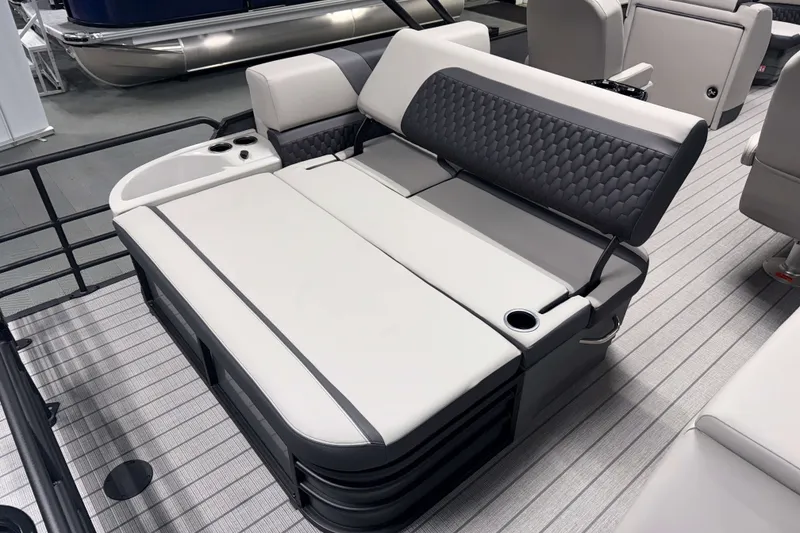 Slide: The Image of Luxurious seating on 2026 Sylvan L3 CLZ DH Tritoon boat with cup holders and modern design. - 3