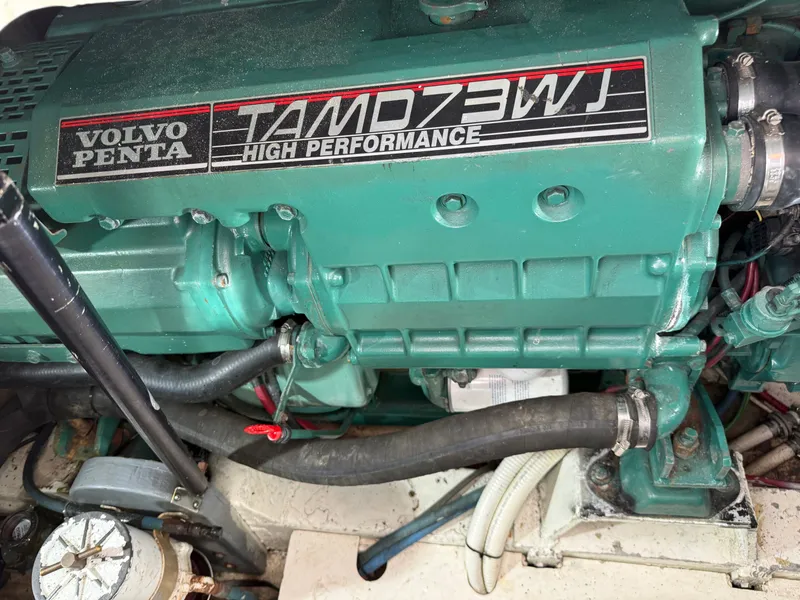 Slide: The Image of A Volvo Penta TAMD73WJ high-performance engine in a 1993 boat. - 46