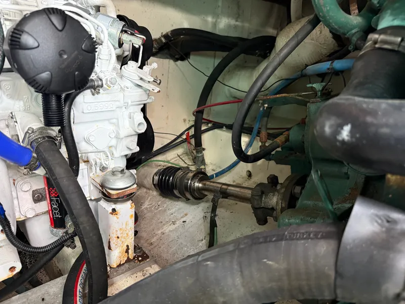 Slide: The Image of Close-up of a boat engine room with motor and hoses. - 48