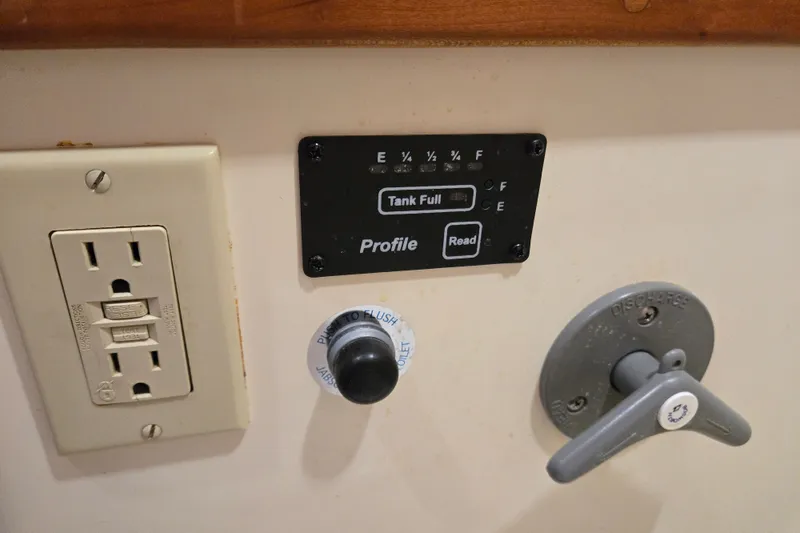 Slide: The Image of Control panel and outlet on 2005 Tartan 3700 yacht interior wall. - 40
