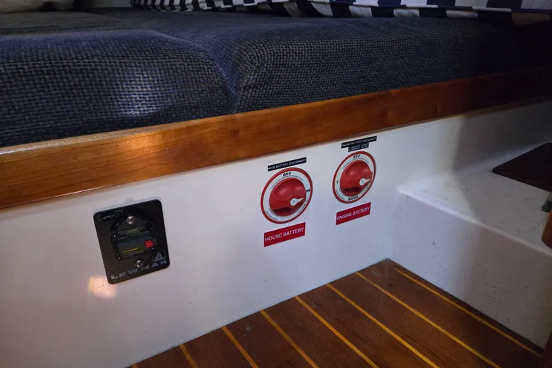 Slide: The Image of Battery switches and controls on a 2005 Tartan 3700 yacht interior. - 35