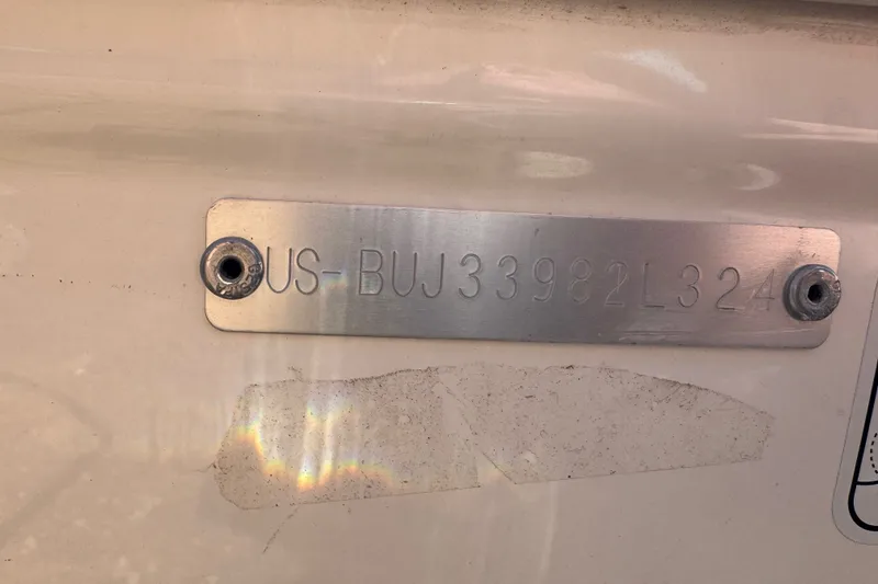Slide: The Image of Metal identification plate on 2024 Tahoe T16 boat with serial number. - 67