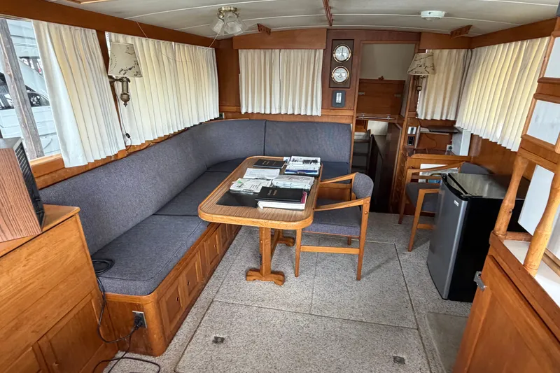 Slide: The Image of Interior of 1969 Grand Banks 42 Classic yacht with cozy seating and wooden furnishings. - 33