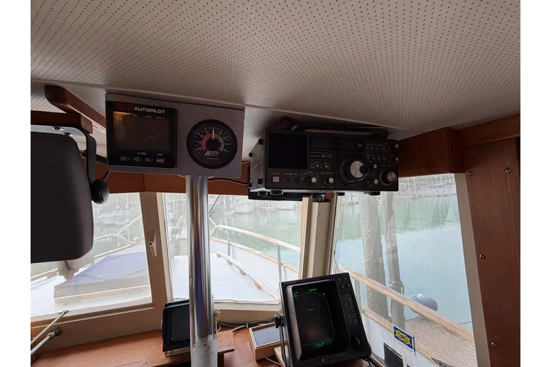 Slide: The Image of Interior view of a 1969 Grand Banks 42 Classic boat cockpit with navigation equipment. - 25
