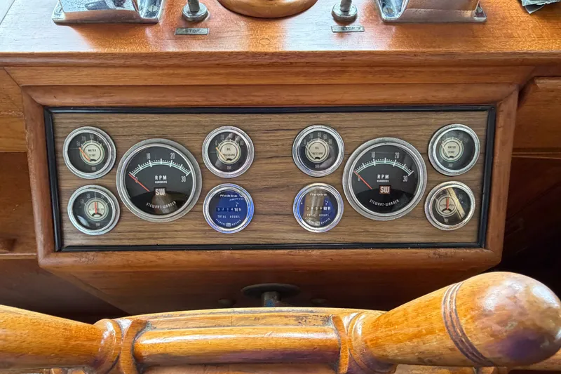 Slide: The Image of Dashboard of a 1969 Grand Banks 42 Classic boat with vintage gauges. - 26