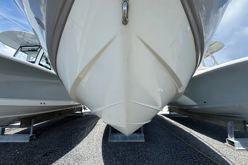 Slide: The Image of 2008 Chaparral Signature 290 boat hull on display, viewed from the front. - 10