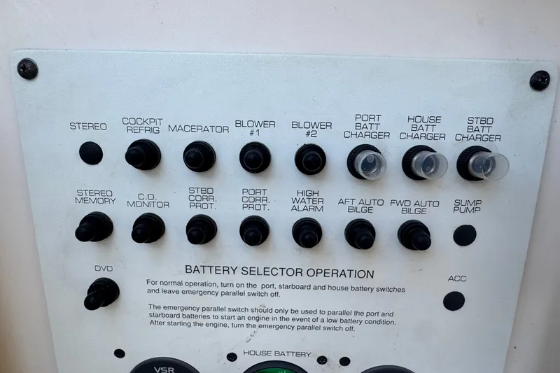 Slide: The Image of Control panel of a 2008 Chaparral Signature 290 boat with various switches and labels. - 69