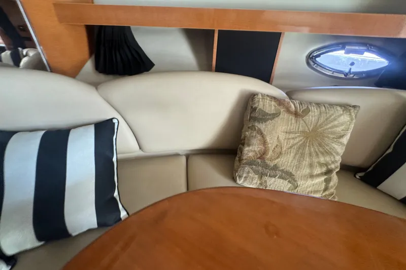 Slide: The Image of Interior of 2008 Chaparral Signature 290 with cushions and porthole window. - 27
