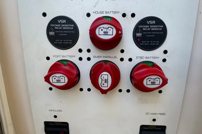 Slide: The Image of Control panel of a 2008 Chaparral Signature 290 boat with battery switches and VSR modules. - 68
