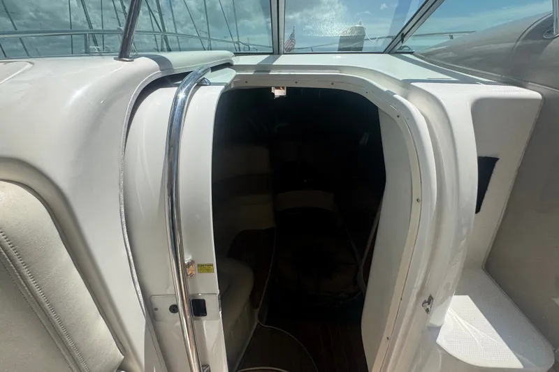 Slide: The Image of 2008 Chaparral Signature 290 cabin entrance with chrome handle and open door. - 21