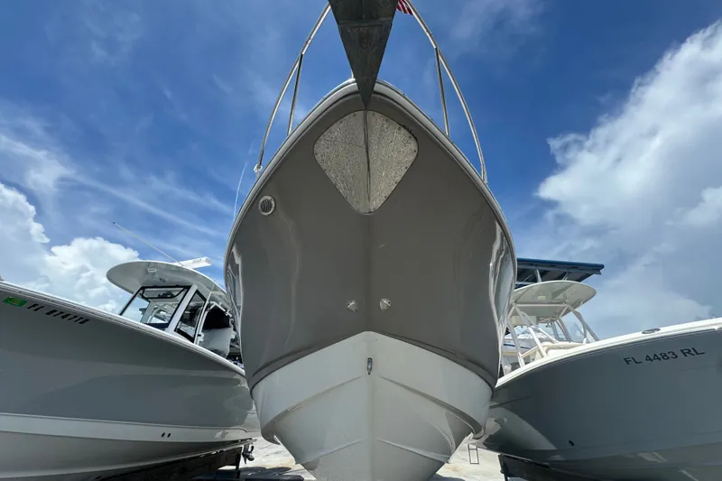 Slide: The Image of 2008 Chaparral Signature 290 boat docked under a clear blue sky. - 9