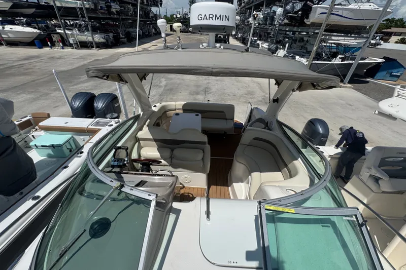 Slide: The Image of 2008 Chaparral Signature 290 boat with Garmin equipment, docked in a marina. - 45